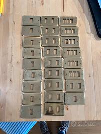 Placche per interruttori in ottone