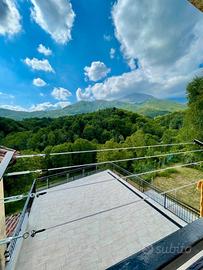 Bilocale immerso nel verde a colleretto