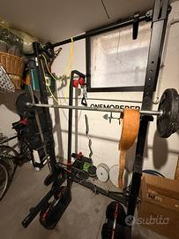 Rack corenght decathlon con pesi e bilanciere
