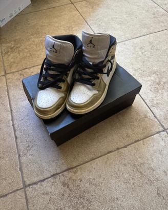 jordan 1 mid gold bleck