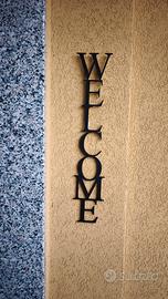 Scritta muro personalizzata per bed & breakfast