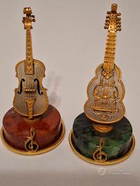 Miniature strumenti in argento anni 70.
