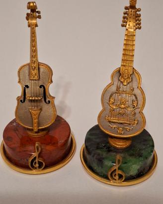 Miniature strumenti in argento anni 70.