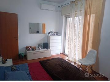 Camera singola in bilocale