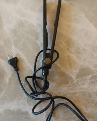 Piastra e spazzola per capelli