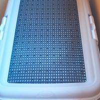 Porta traversina con griglia 