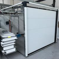 Portone sezionale doppio con porta 2400 x H 2100