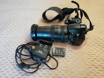 Nikon D3000 + Nikon AF 18-200 mm. VR DX II + flash