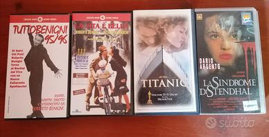 Lotto 8 VHS film/cartoni Walt Disney vari