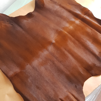 Pelle vitello marrone