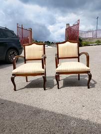 Coppia di poltrone in legno e tessuto 