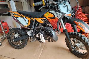 mini cross Atomic 50 