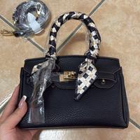 Borsetta a mano nera