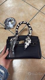 Borsetta a mano nera