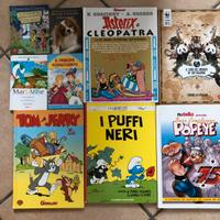 Libri asterix , puffi, c’era una volta l’uomo