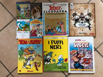 Libri asterix , puffi, c’era una volta l’uomo