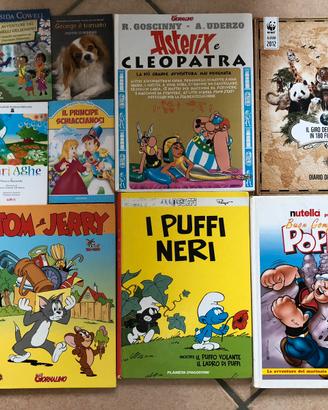 Libri asterix , puffi, c’era una volta l’uomo