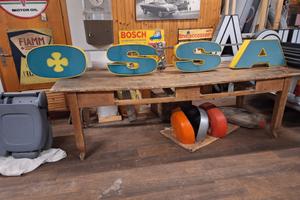 Insegna luminosa OSSA neon