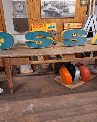 Insegna luminosa OSSA neon