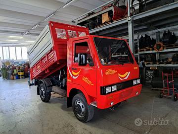 Macchina operatrice COMACA 4X4 con ribaltabile