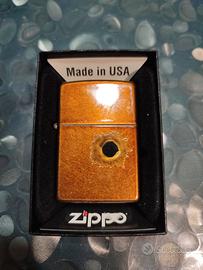 Accendino Zippo con foro di proiettile
