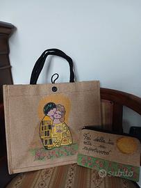 Borsa e pochette in juta dipinte a mano 