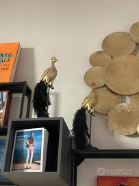 Statue pavoni dorati