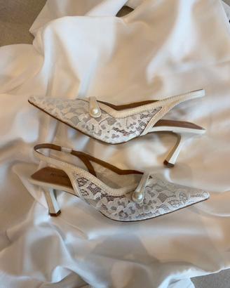 Décolleté slingback bianche in pizzo e vera pelle