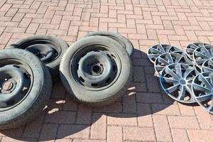 4 cerchi in ferro a 4 fori da 15'' + 7 copricerchi
