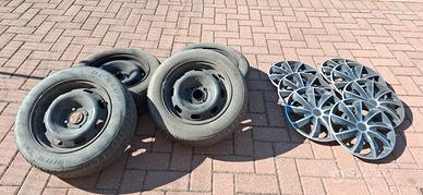 4 cerchi in ferro a 4 fori da 15'' + 7 copricerchi