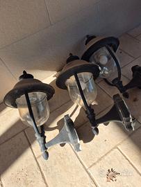 Lampioni da parete in metallo e resina