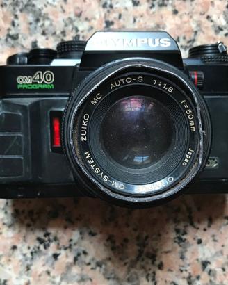 Olympus OM40 Program