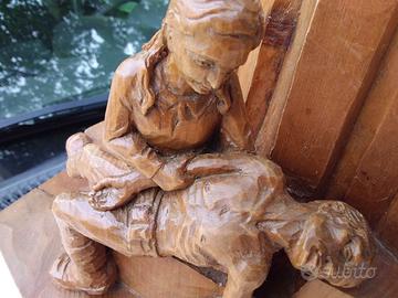 sopramobile scultura in legno