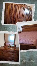 Camera da letto e stanza da pranzo.