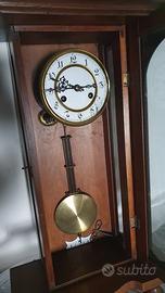 Orologio a pendolo da parete