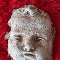piccolo putto di gesso