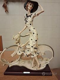 Donna in bicicletta Giuseppe Armani