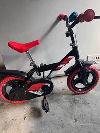 Bicicletta da bambino/a con rotelle
