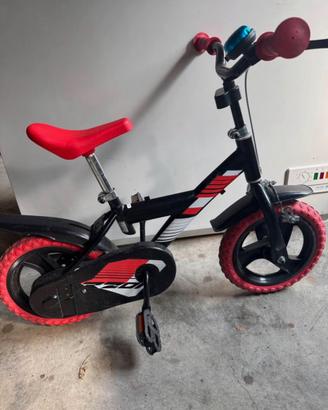Bicicletta da bambino/a con rotelle