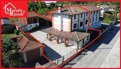 Ampia BIFAMILIARE con terreno a Castello di Porpet