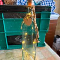 Bottiglia vetro + luci e centrotavola con conchigl