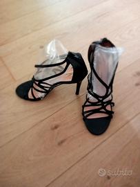 scarpe con tacco nere di pelle eleganti