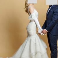 Abito da sposa a sirena con strascico