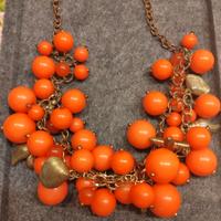 Collana bigiotteria perle arancioni e charm marini