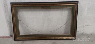 Cornice per tela in legno intarsiato