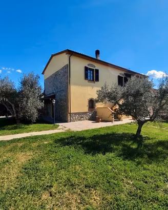 PORZIONE DI CASALE CON TERRENO