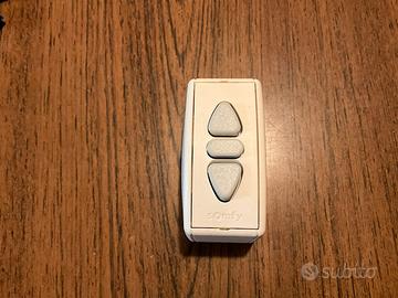 Pulsante a mantenimento per avvolgibili somfy