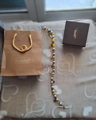 Bracciale con pietre gialle e condoli