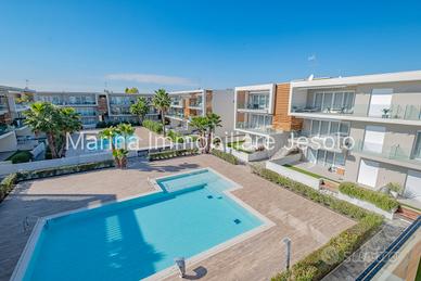 ELEGANTE APPARTAMENTO CON PISCINA PARI AL NUOVO