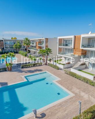ELEGANTE APPARTAMENTO CON PISCINA PARI AL NUOVO